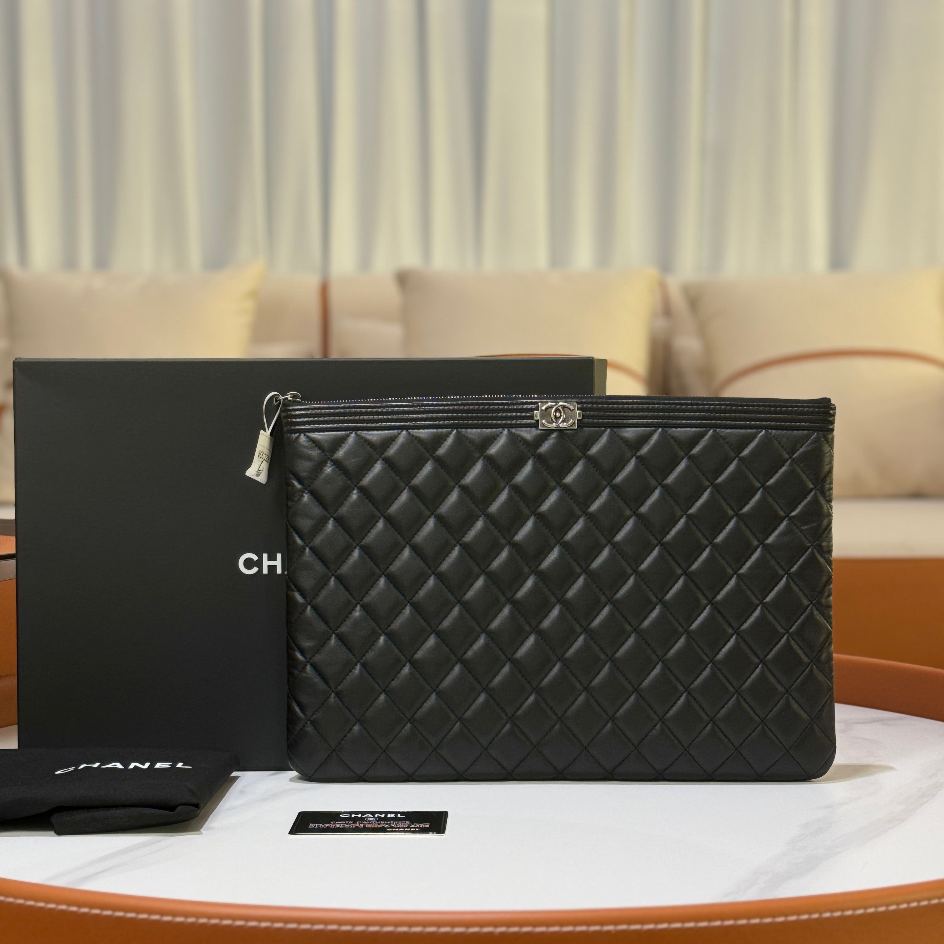 CHANEL BOY CLUTCH LAMBSKIN BLACK