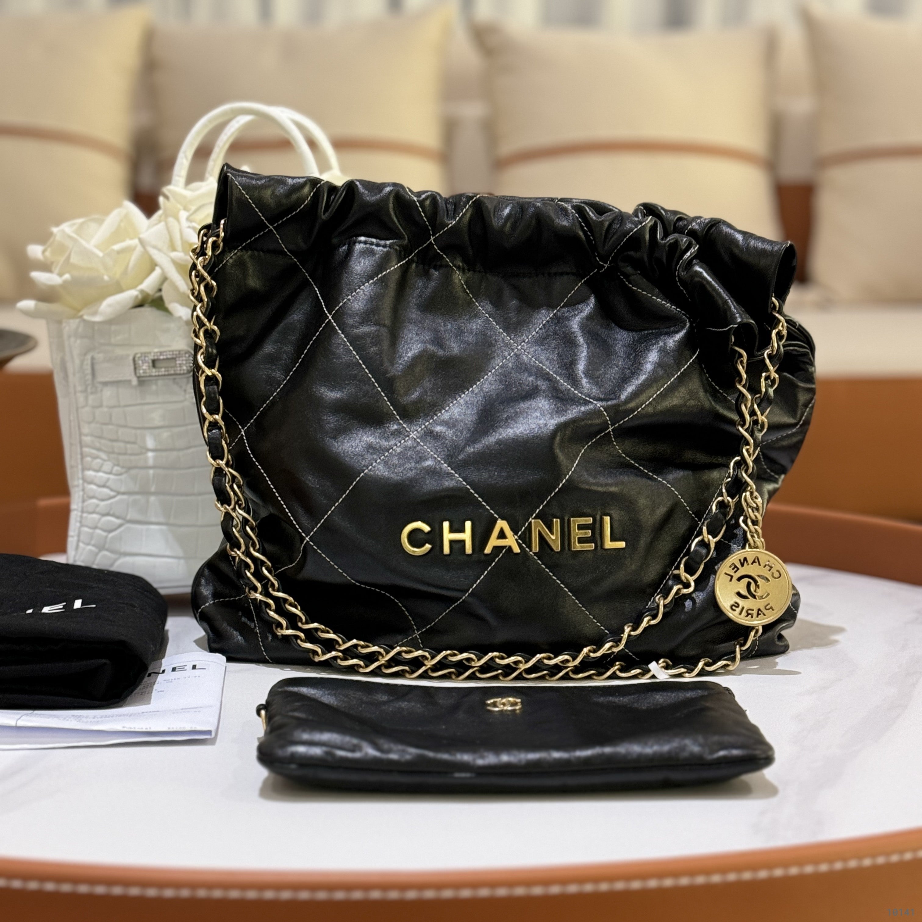 CHANEL 22BAG SMALL IN BLACK WITH WHITE STITCHING | COLLINS RAIN