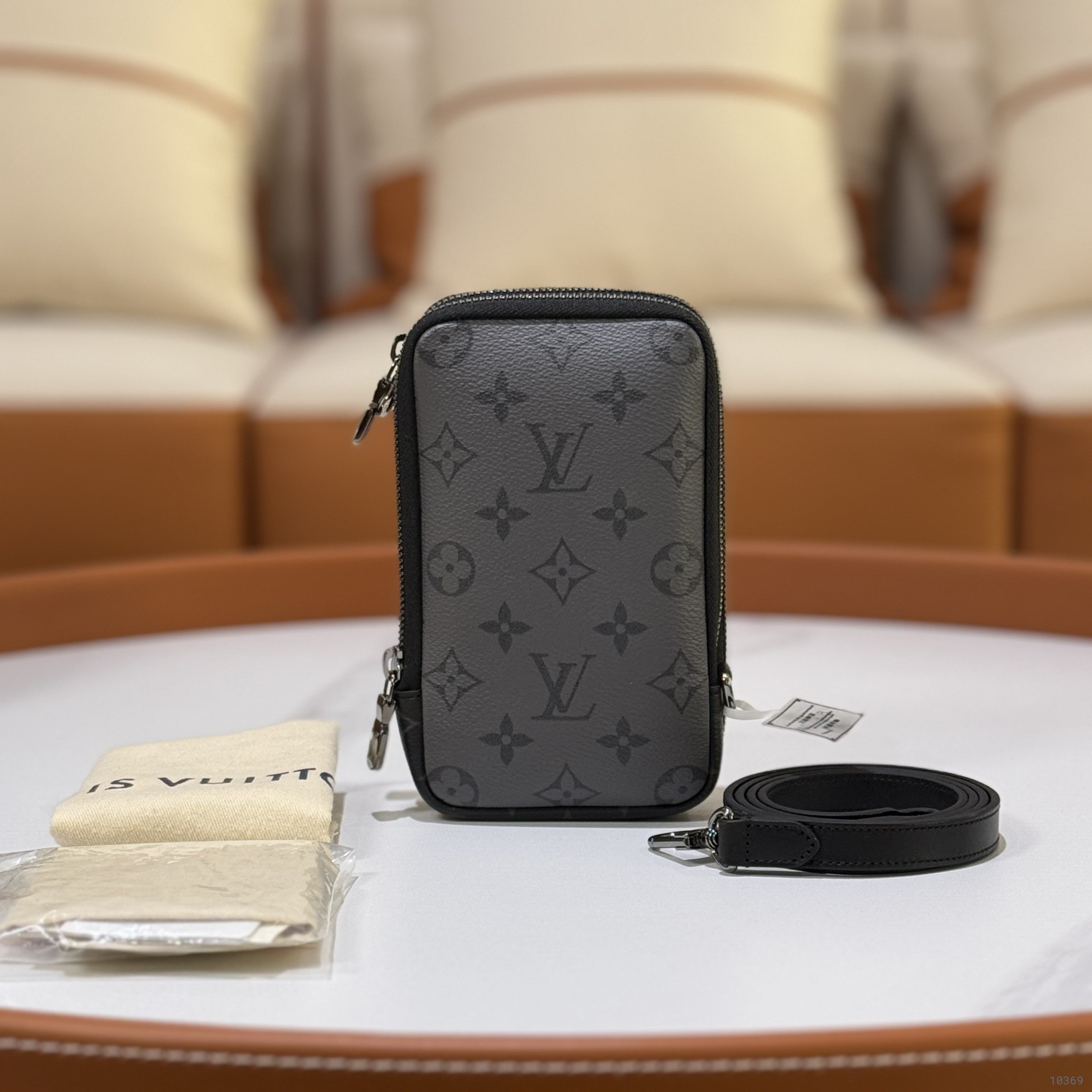 LOUIS VUITTON BLACK WARRIOR SMARTPHONE BAG (MICROCHIP)