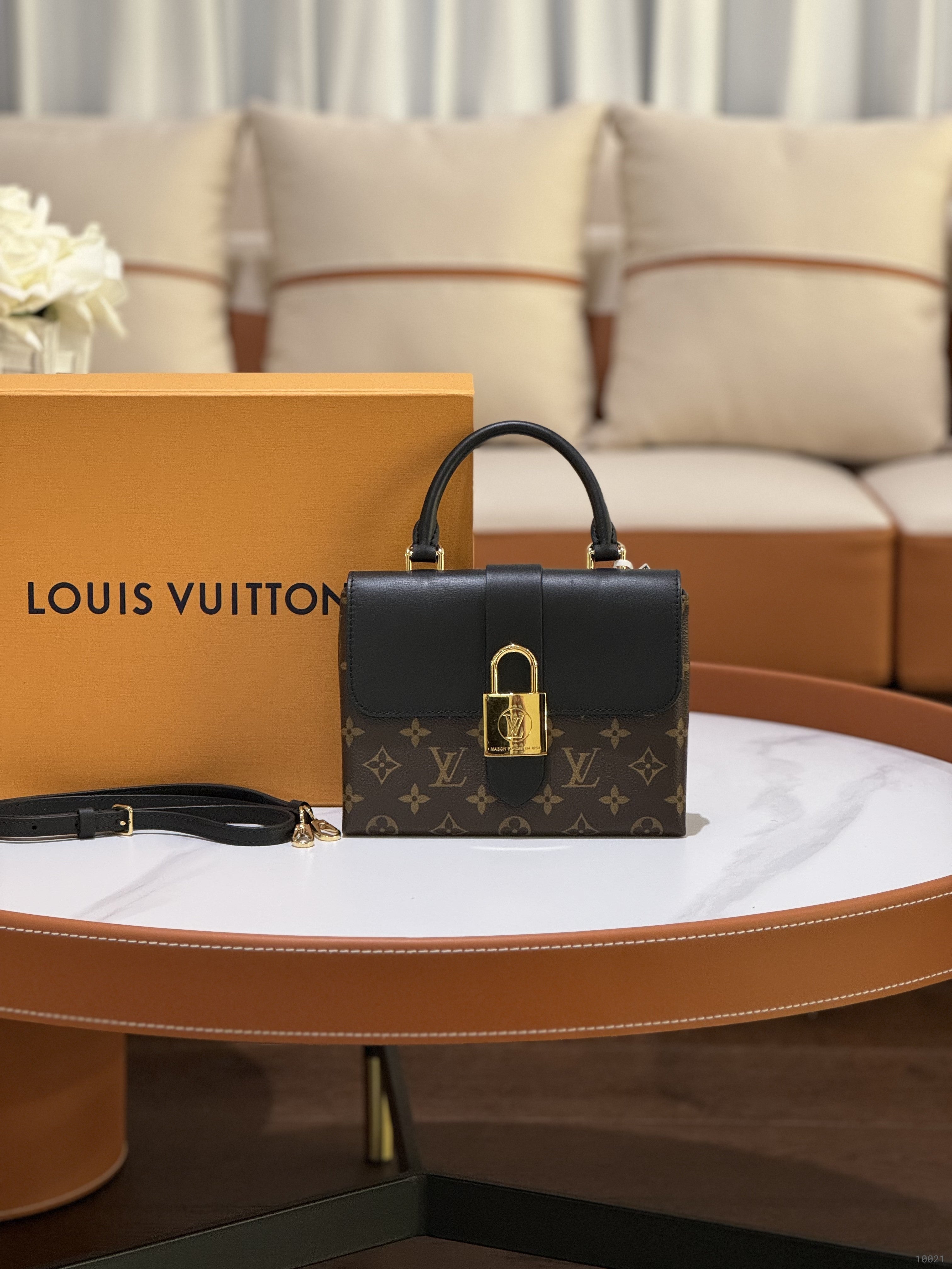 LOUIS VUITTON LOCKY BAG | COLLINS RAIN