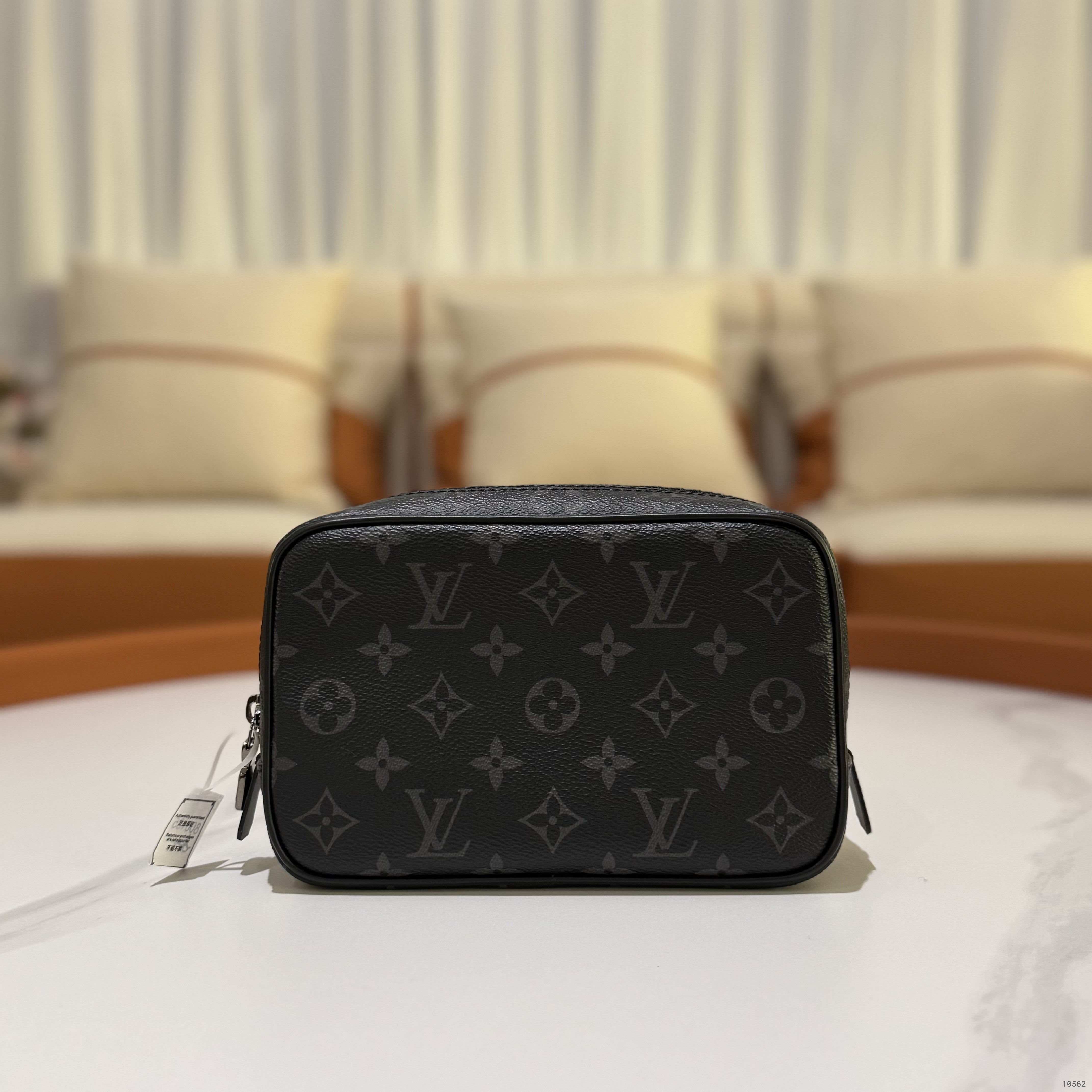 LOUIS VUITTON BLACK FLOWER HANDHELD TOILETRY BAG