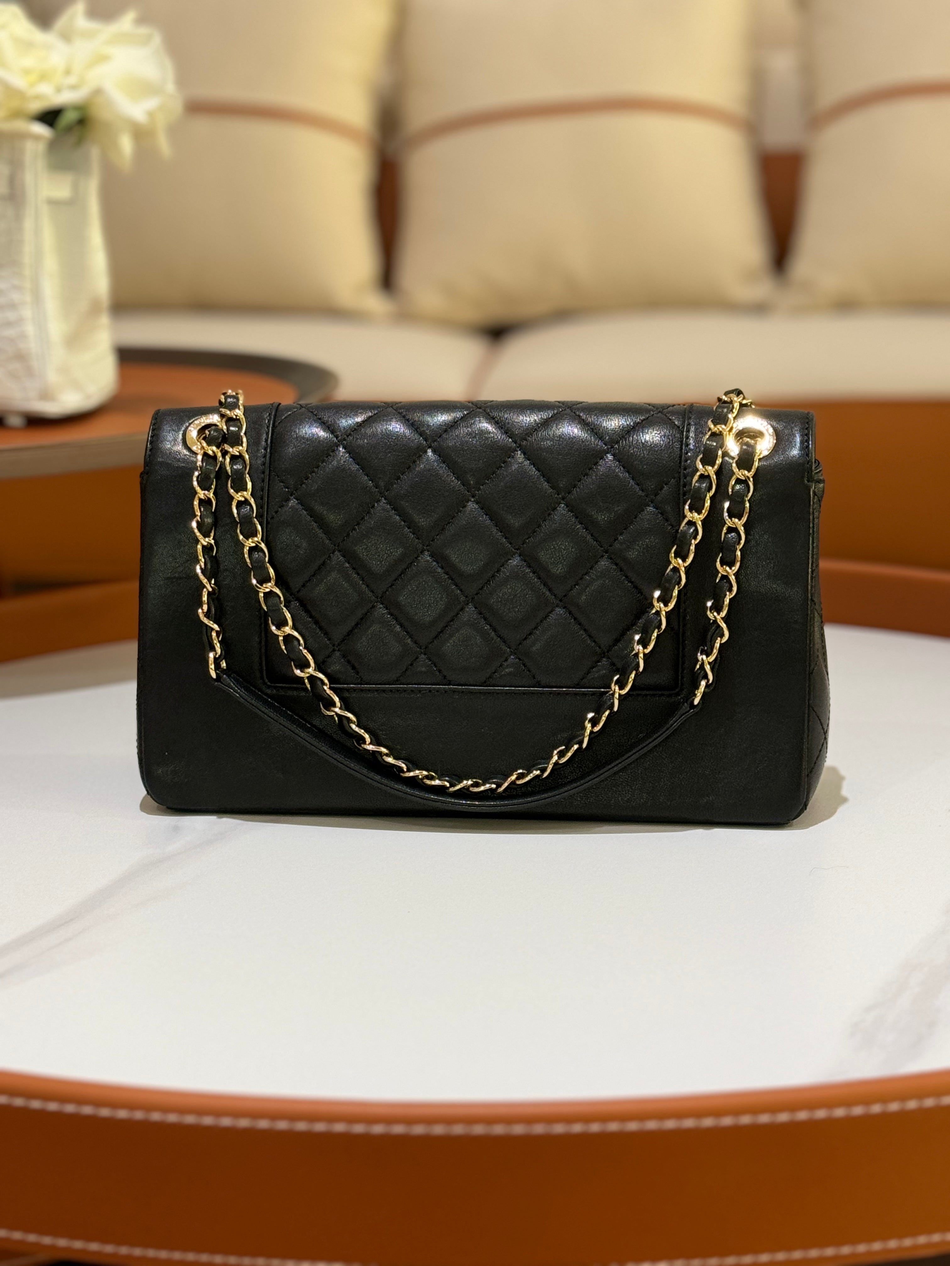 CHANEL BLACK FLAP BAG | COLLINS RAIN