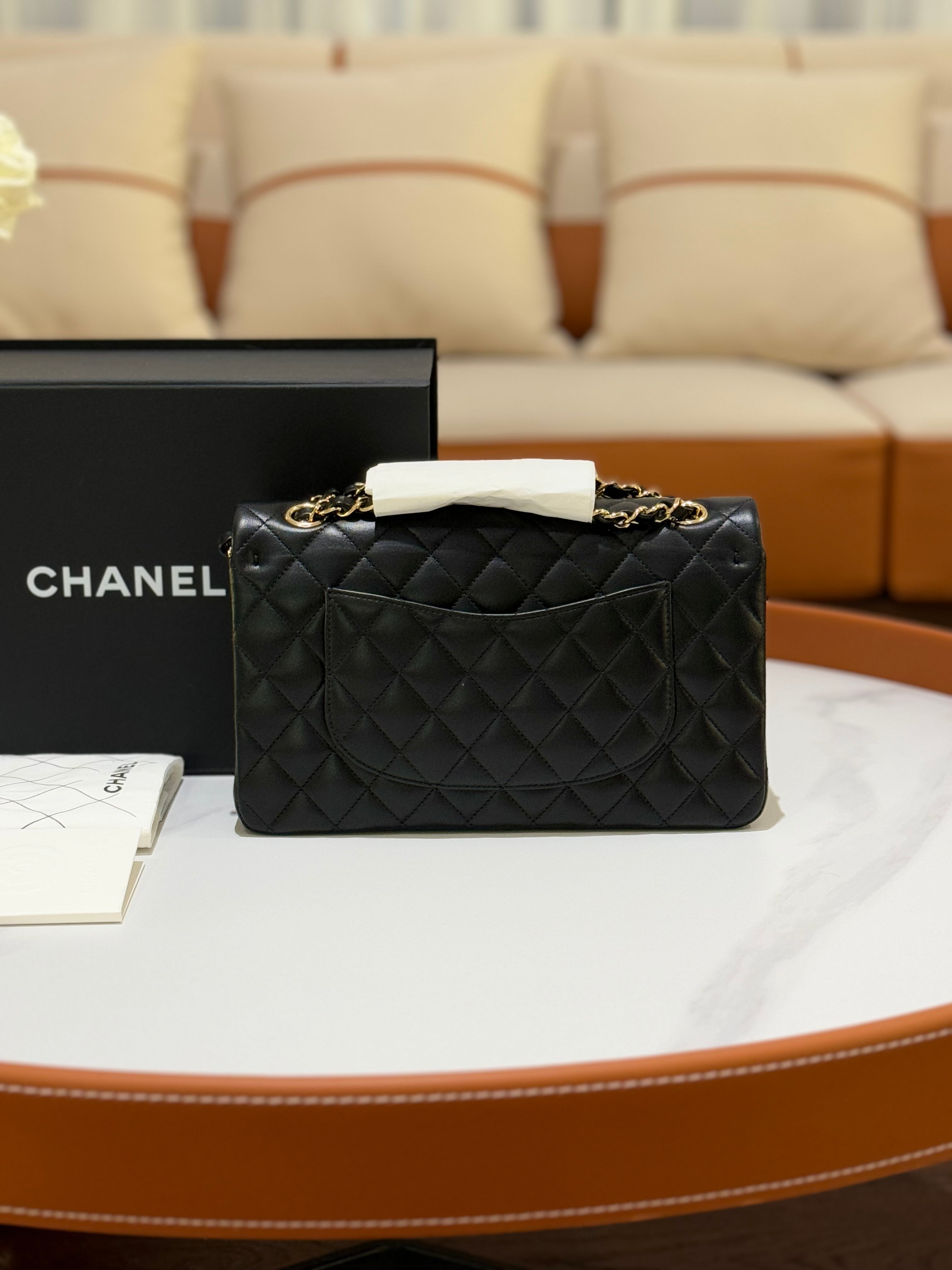 CHANEL CLASSIC FLAP MEDIUM BLACK LAMBSKIN WITH GOLD HARDWARE AND CHIP | COLLINS RAIN