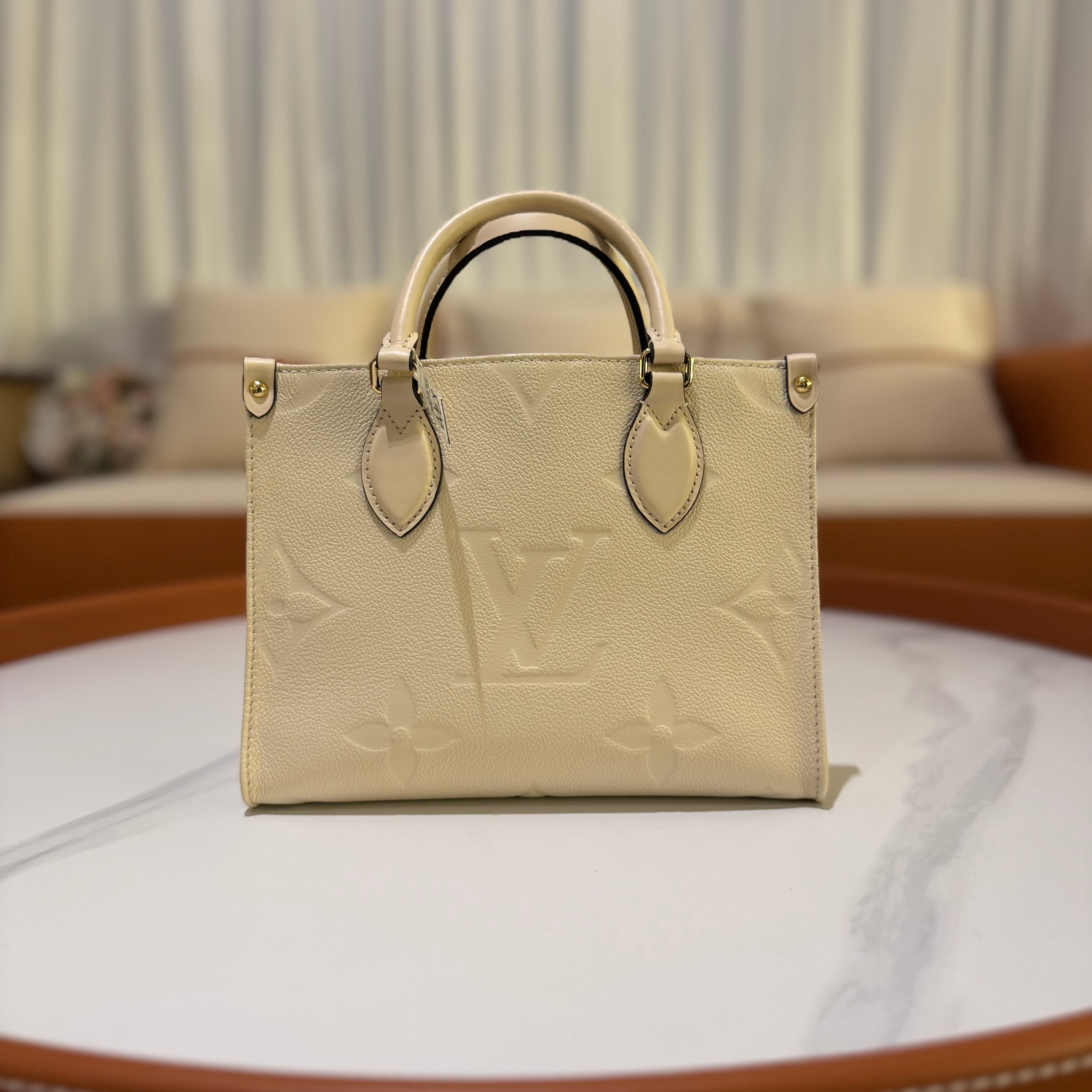 LOUIS VUITTON ON THE GO TOTE CREAM FULL LEATHER