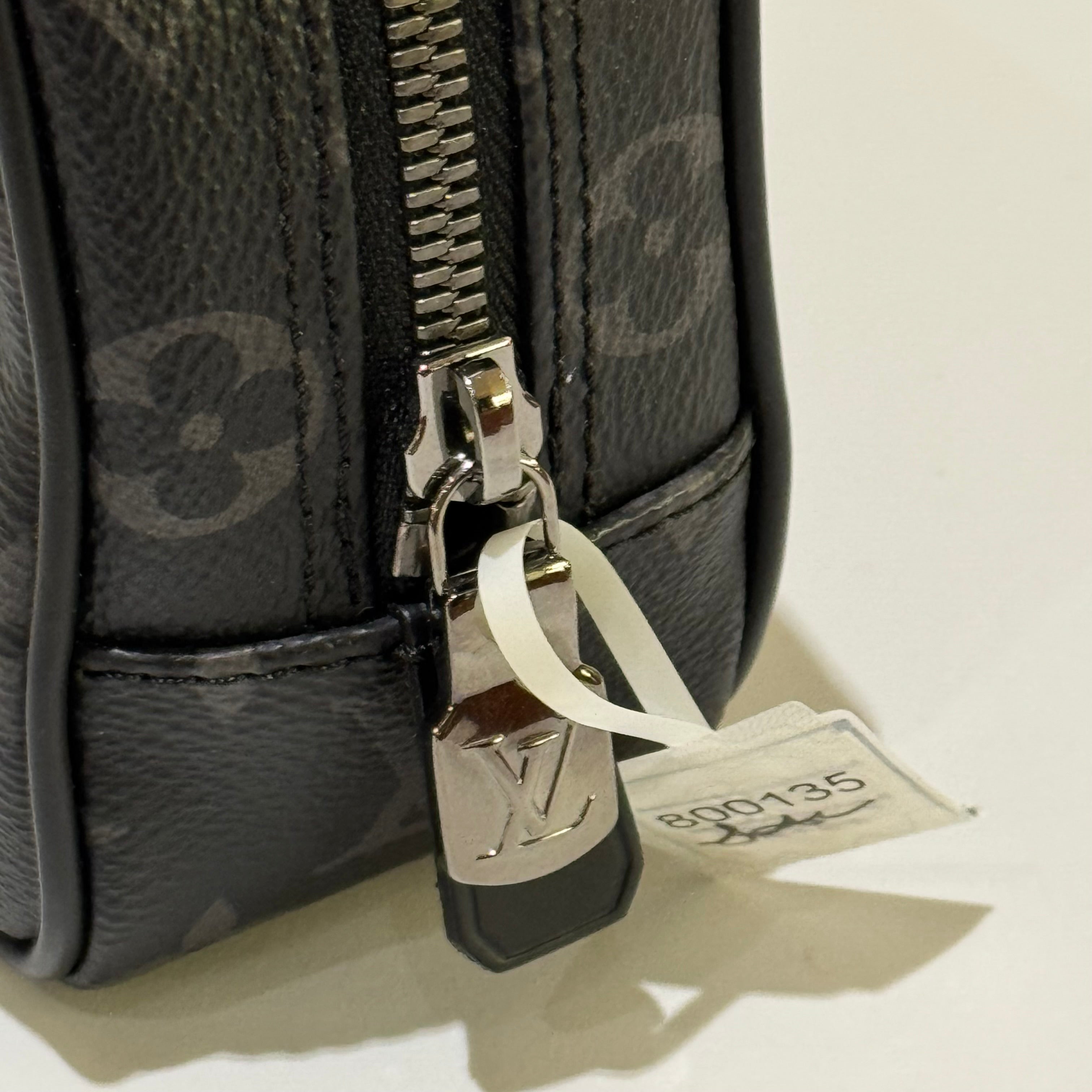 LOUIS VUITTON BLACK FLOWER HANDHELD TOILETRY BAG