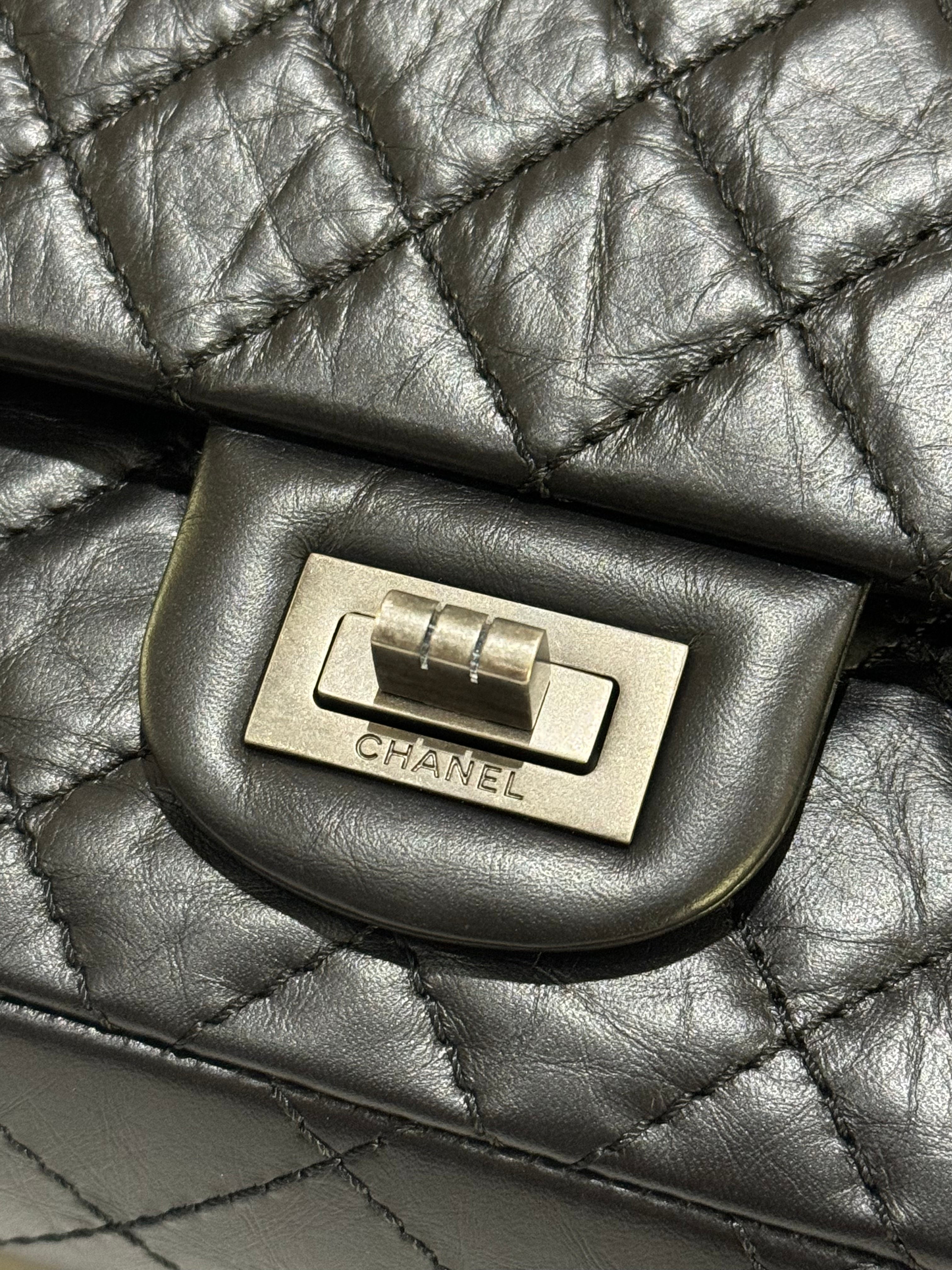 CHANEL 2.55 BLACK WITH SILVER HARDWARE AND CHIP | COLLINS RAIN