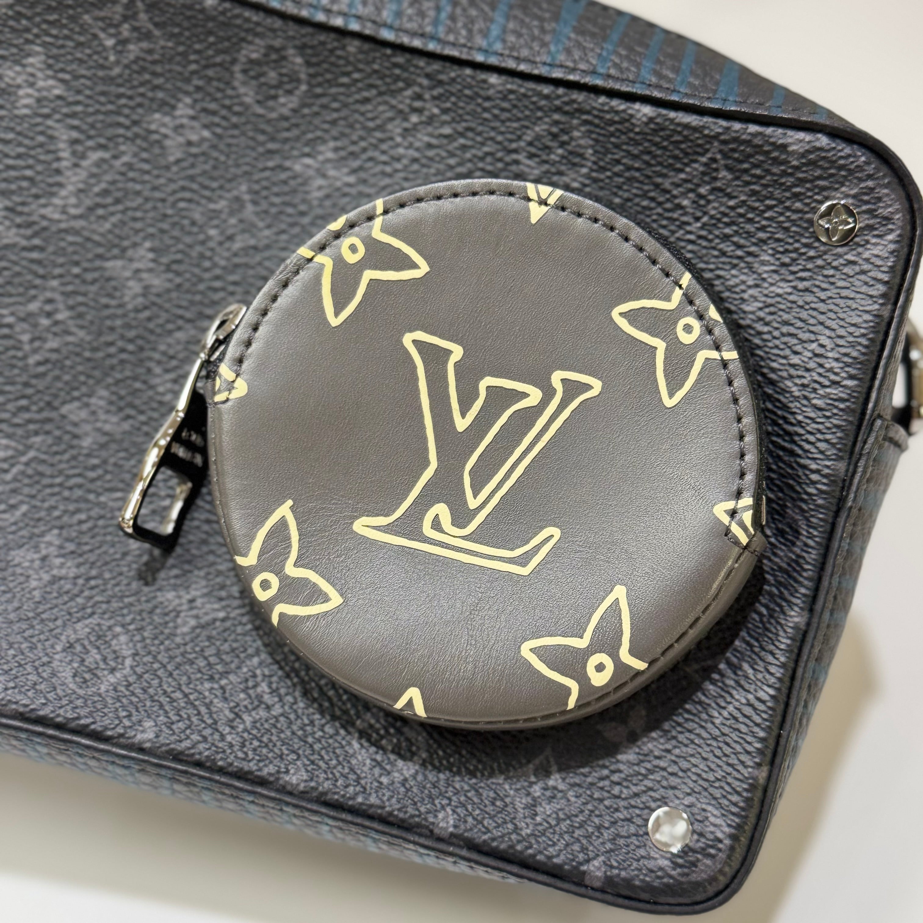 LOUIS VUITTON POSTMAN BAG