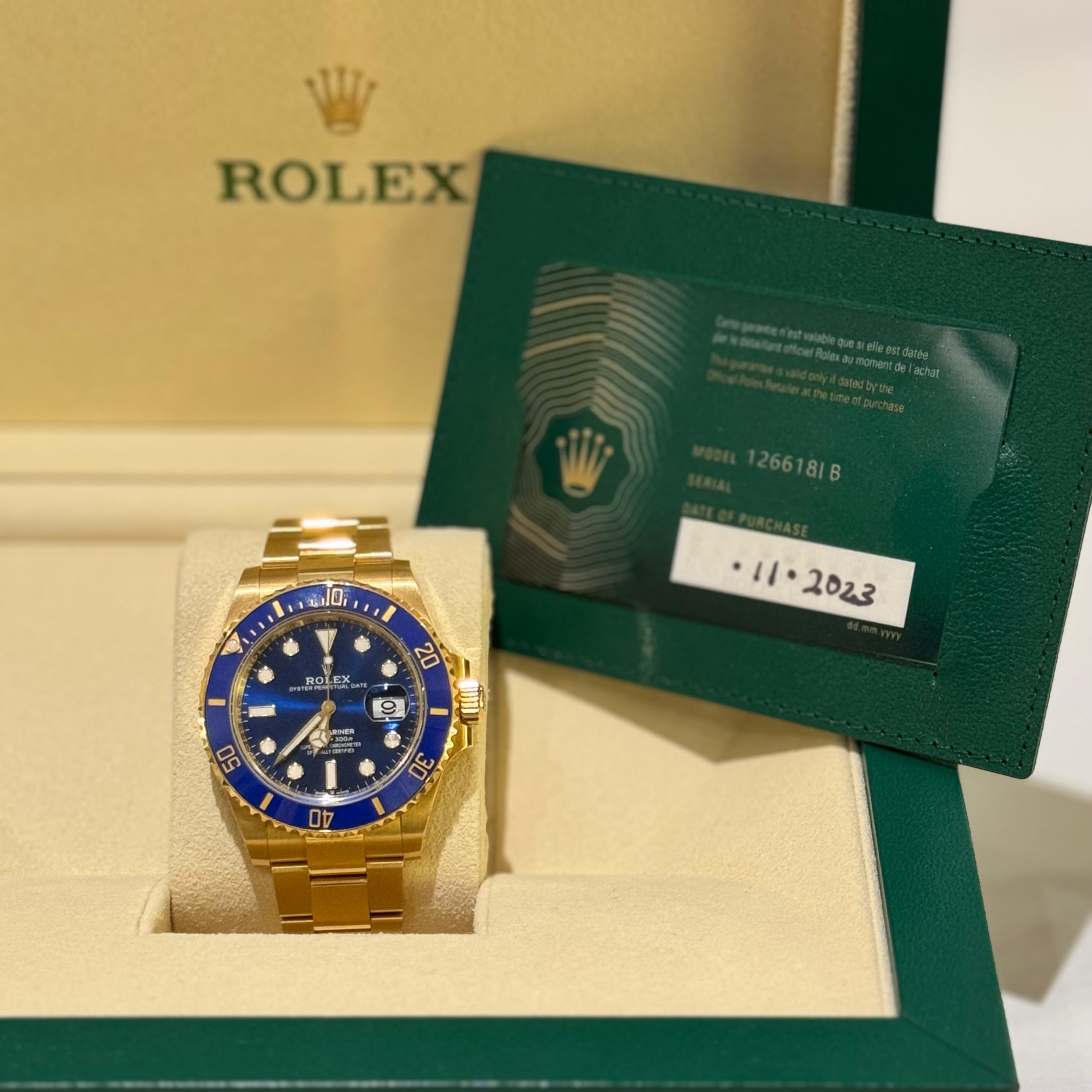 ROLEX OYSTER PERPETUAL DATE SUBMARINER M126618LB 18K GOLD BLUE DIAL