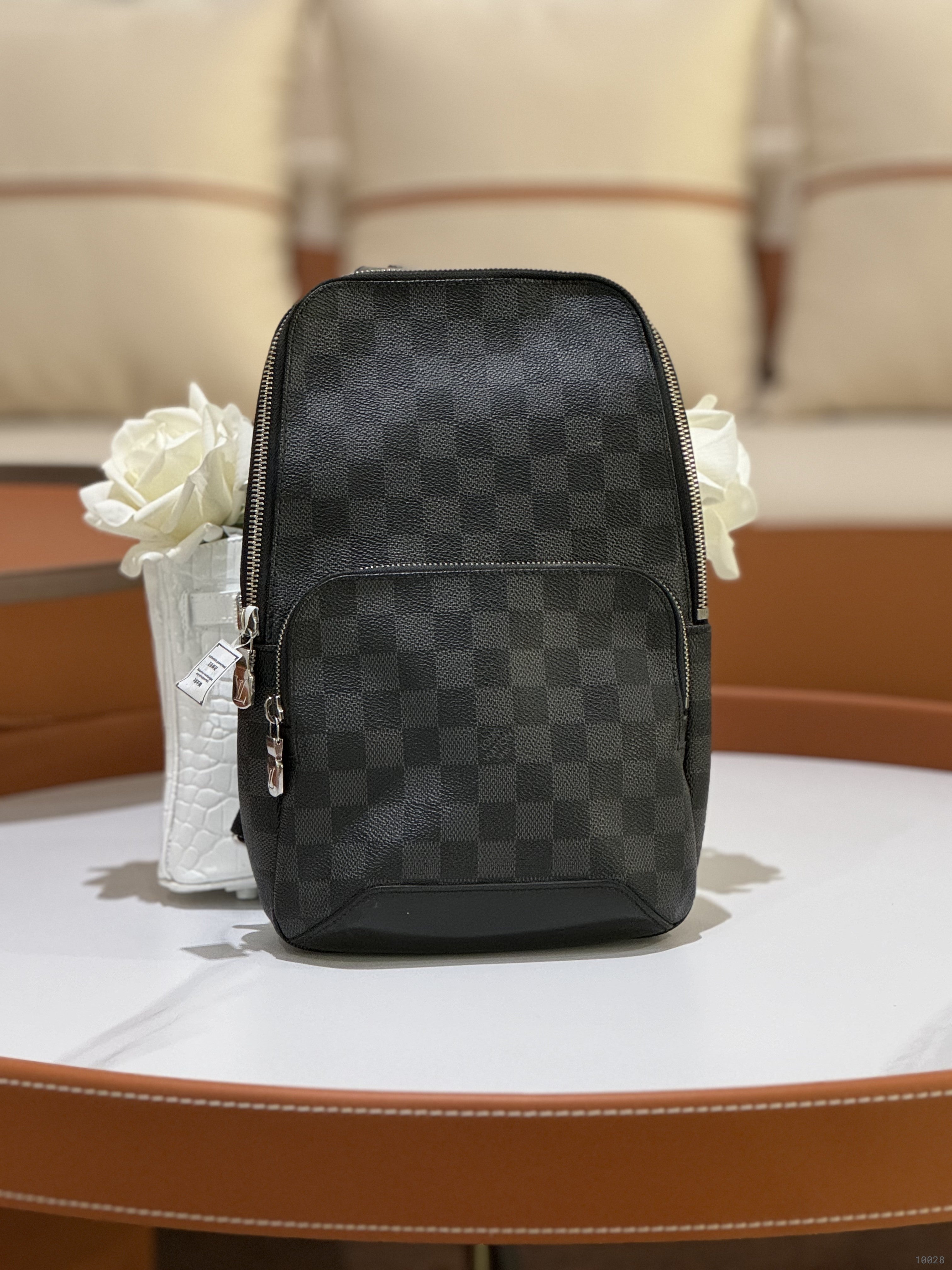 LOUIS VUITTON AVENUE BLACK CHECKERED BACKPACK | COLLINS RAIN